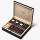 Sachets de thés dans un coffret Bois Dammann Frères de 8 saveurs. 